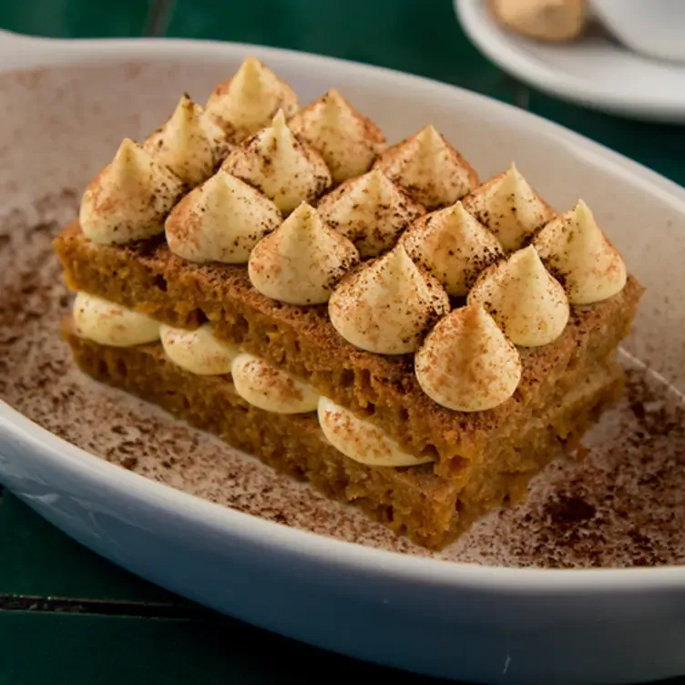 Un típico tiramisú al café en Torino - Santa Fe, una de las mejores pizzerías en CDMX.